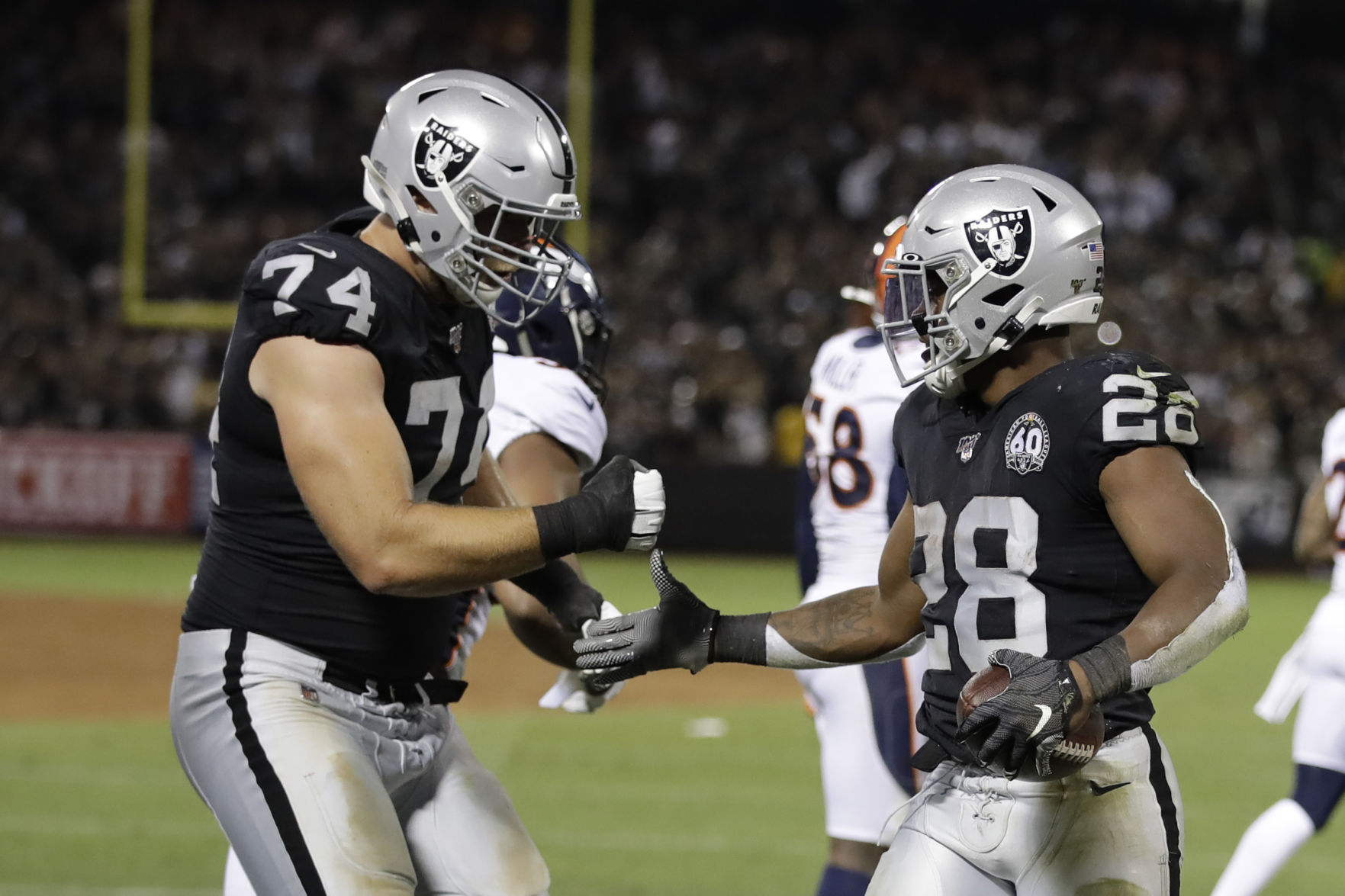 Broncos Raiders Football